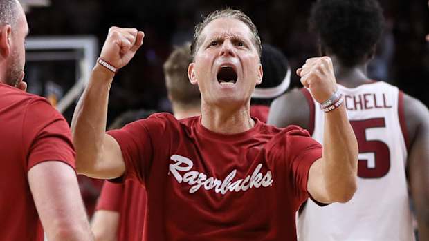 Razorbacks coach Eric Musselman celebrates exhibition win over Purdue on Saturday